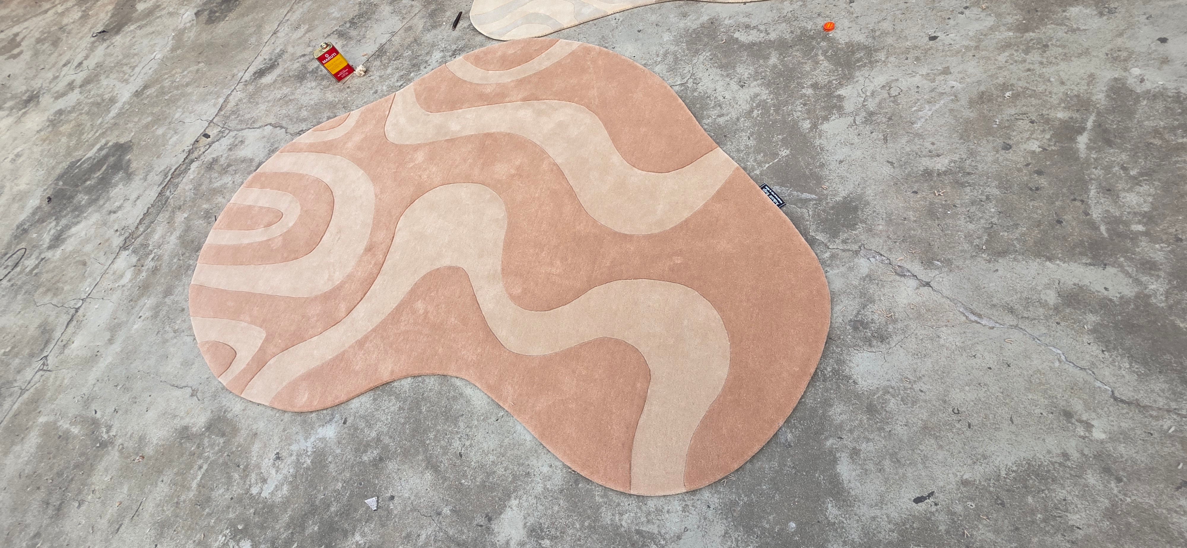 Aarvī – Soft Pink Abstract Rug (Irregular Shape)