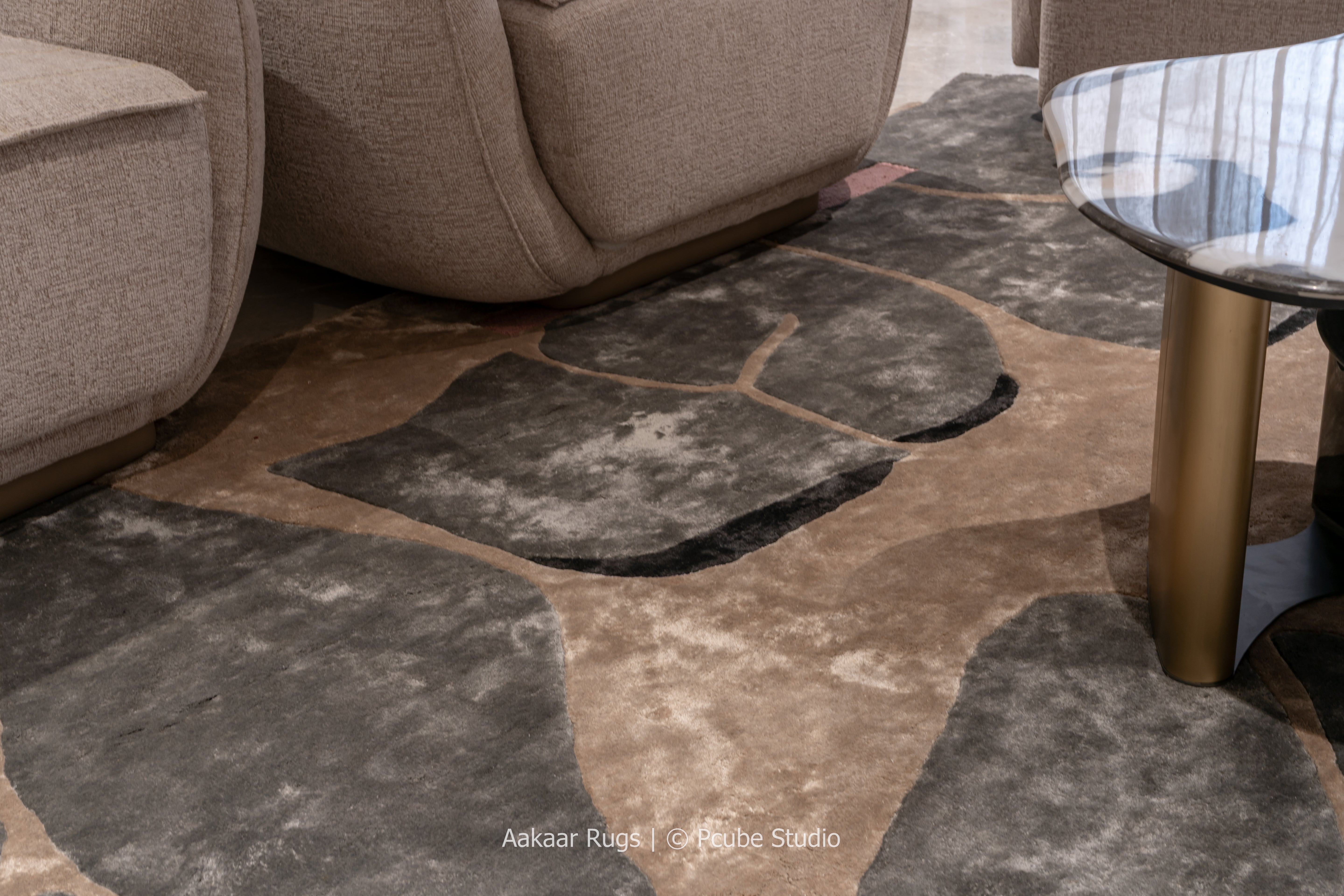 Patterned rug with stone design in a living room setting